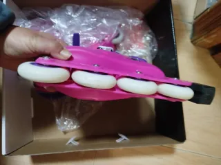 Patines infantiles Oxelo rosas y morados