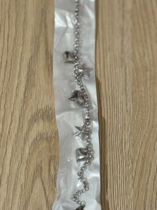 Bracciale con ciondoli a cuore e stella