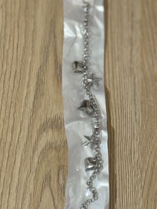 Bracciale con ciondoli a cuore e stella