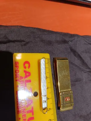 Lotto fermacravatte e fermasoldi YSL Valentino