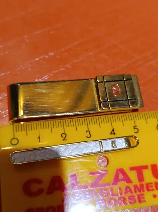 Lotto fermacravatte e fermasoldi YSL Valentino