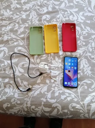 Teléfono Xiaomi Redmi Note 10 5 G.Con 3 carcasas