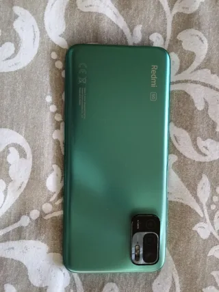 Teléfono Xiaomi Redmi Note 10 5 G.Con 3 carcasas