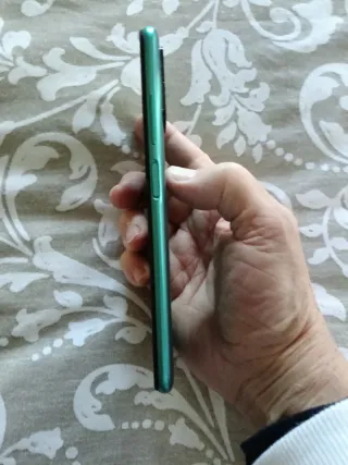 Teléfono Xiaomi Redmi Note 10 5 G.Con 3 carcasas