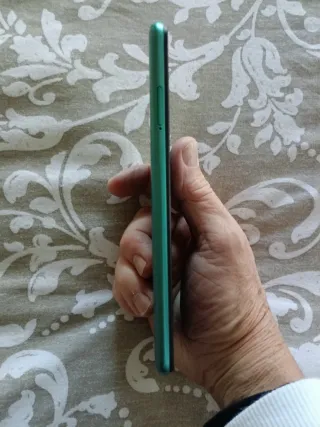 Teléfono Xiaomi Redmi Note 10 5 G.Con 3 carcasas