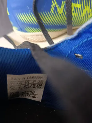 Botas de fútbol Adidas azules y verdes