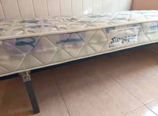 Cama individual con cabecero