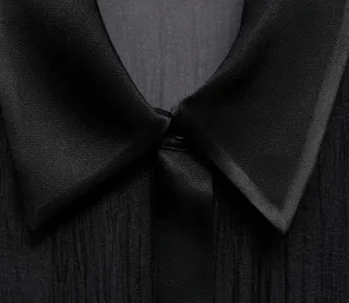 Camisa semitransparente satinada