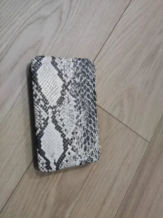 Bolso de mano estampado animal.