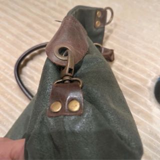 Borsa vintage in pelle verde e con manici marroni