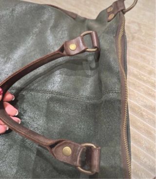 Borsa vintage in pelle verde e con manici marroni