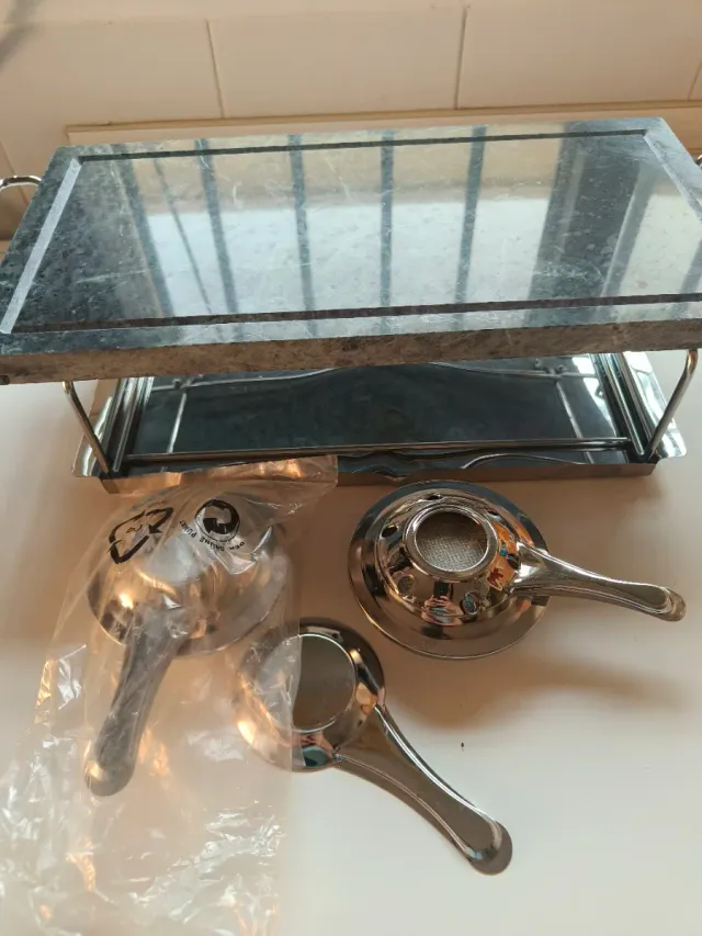 Plancha de piedra con quemadores