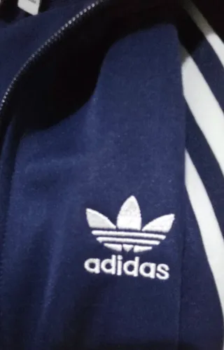Chaqueta deportiva Adidas Originals azul y blanca