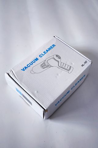 Mini aspirador de mano con accesorios