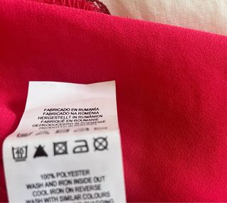 Camisa fucsia asimétrica