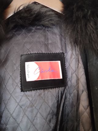 Abrigo ante negro mujer