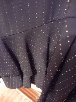 Falda fiesta con brillos dorados