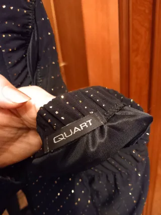 Falda fiesta con brillos dorados