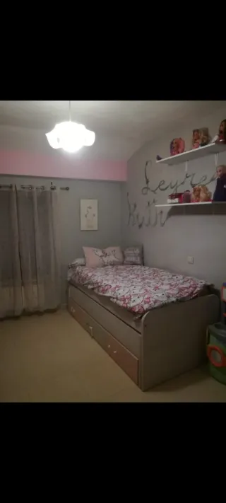 Cama nido gris y rosa
