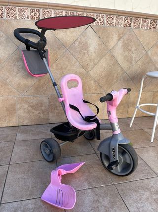 Triciclo rosa para niña con capota