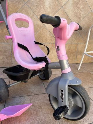 Triciclo rosa para niña con capota