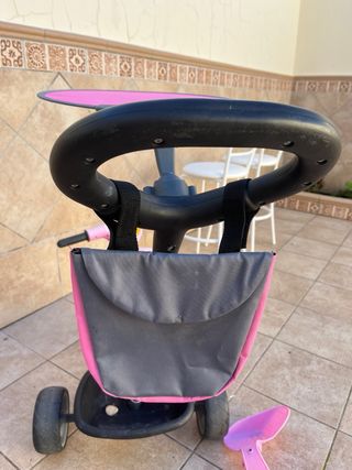 Triciclo rosa para niña con capota