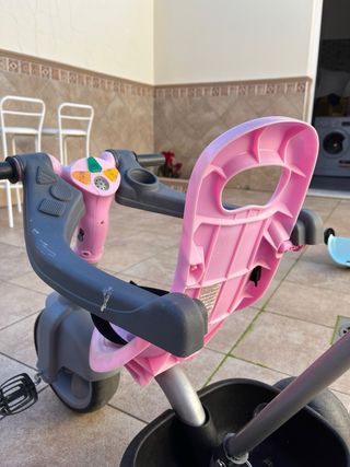 Triciclo rosa para niña con capota