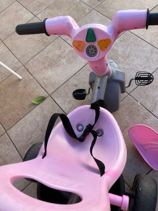Triciclo rosa para niña con capota