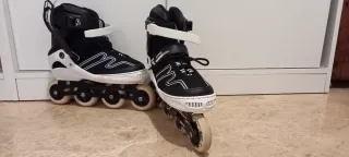 Patines seminuevos en línea negros y blancos