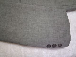 Americana gris hombre