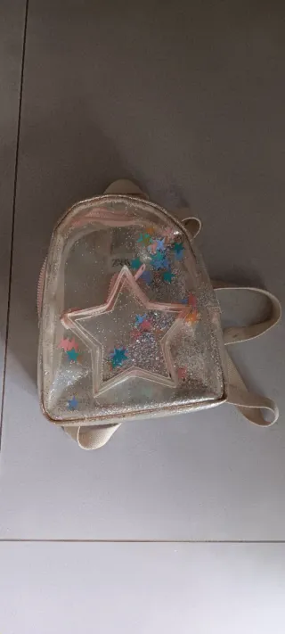 Mochila transparente con estrellas
