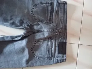 Pantalones vaqueros grises mujer
