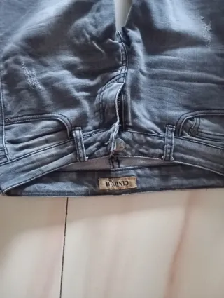 Pantalones vaqueros grises mujer