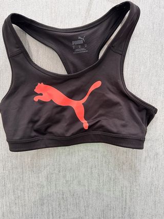 Sujetador deportivo Puma negro y naranja