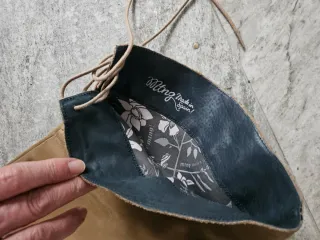 Botas altas de piel beige y marrón