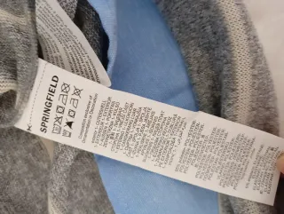 Jersey gris con efecto superposición