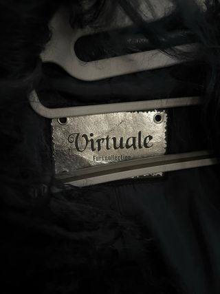 Chaqueta de cuero y pelo azul marino