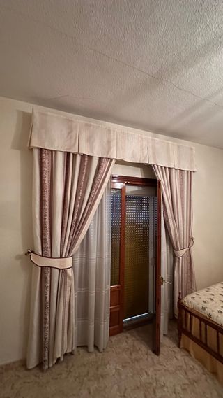 Cortinas beige y marrones