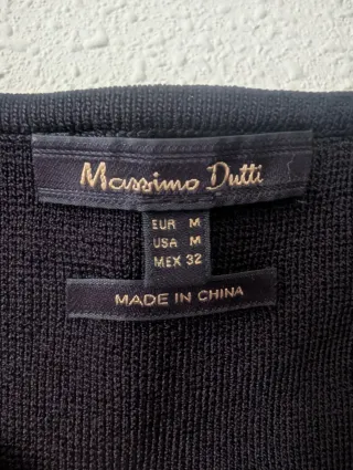 Top negro con volantes