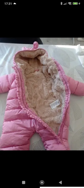 Buzo rosa con orejas para niña