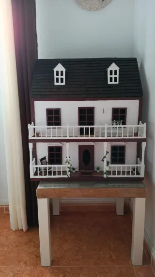 Casa de muñecas con accesorios