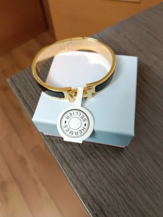 Pulsera Hermes Negra y Dorada