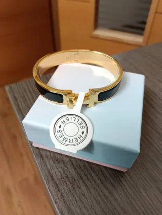 Pulsera Hermes Negra y Dorada