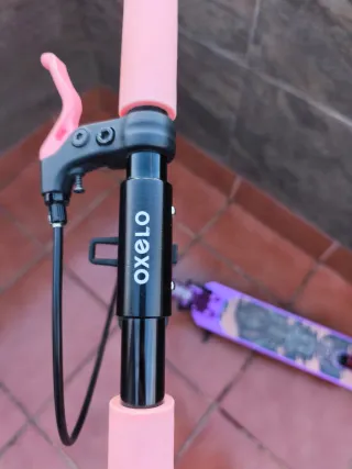 Patinete  OXELO morado decathlon