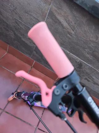 Patinete  OXELO morado decathlon