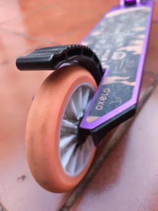Patinete  OXELO morado decathlon
