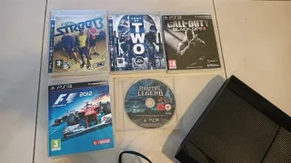 Consola PS3 Super Slim Nera + 2 Controller + 5 Giochi