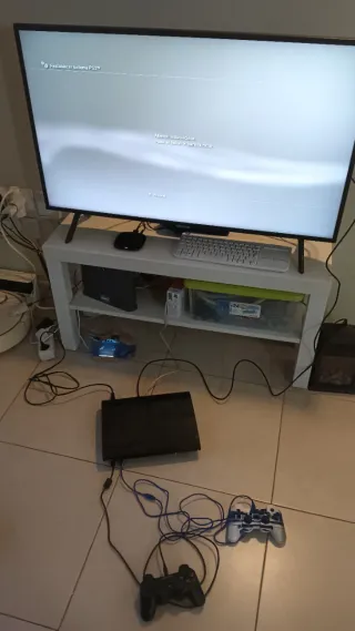 Consola PS3 Super Slim Nera + 2 Controller + 5 Giochi