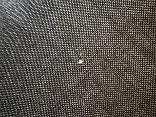 Sofá extensible de dos plazas gris tela