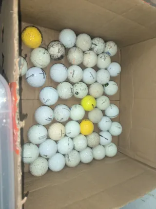 Lote pelotas de golf desgastadas